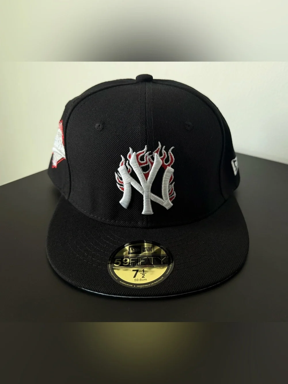 New Era Black Fitted Cap with White NY Flame Logo
